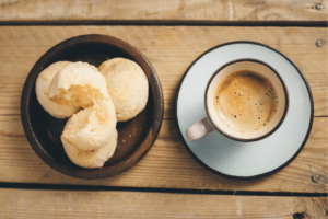 A photo of Brazilian Cheese bread and coffee