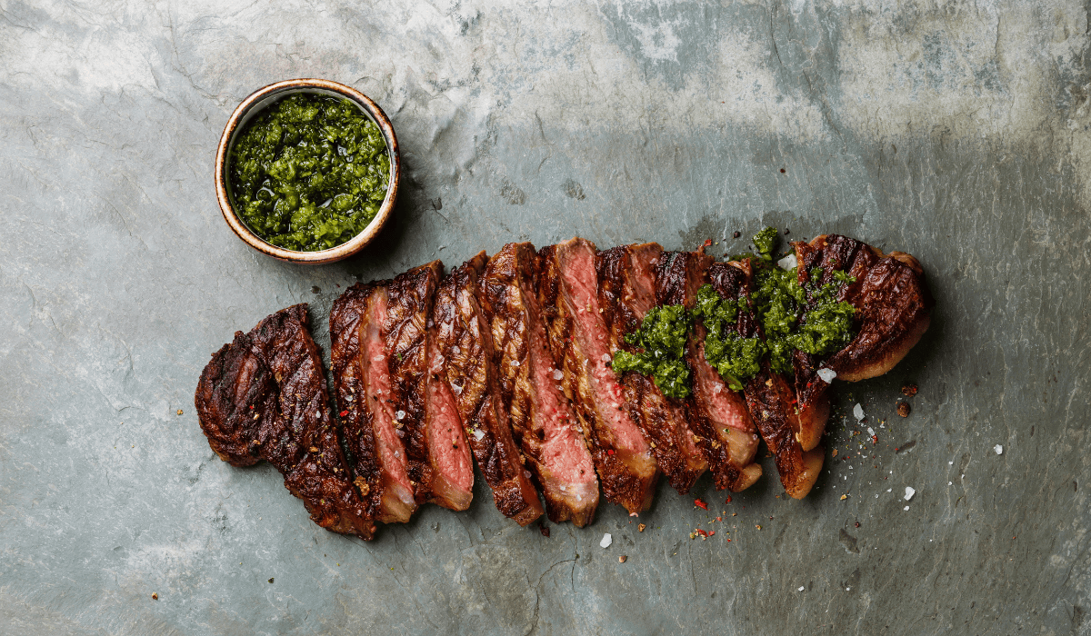 medium rare flank steak with chimichurri