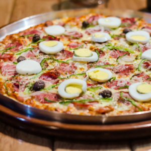 Brazilian style pizza with boiled egg and ham