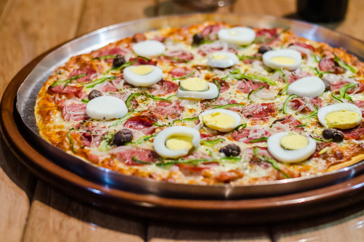 Brazilian style pizza with boiled egg and ham