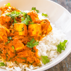 Brazilian savory pumpkin stew served over white rice