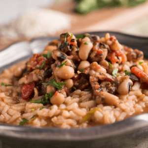 Black eyed peas and rice in black serving dish