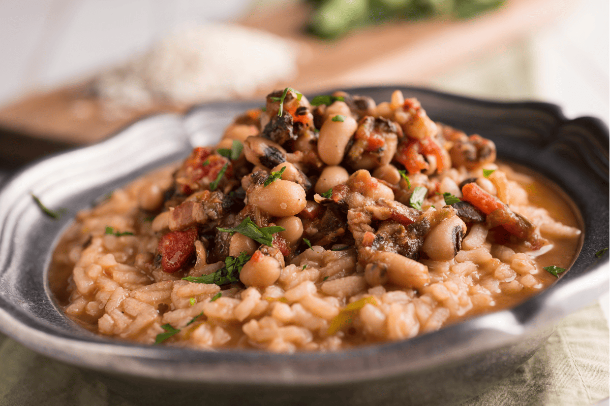 Black eyed peas and rice in black serving dish