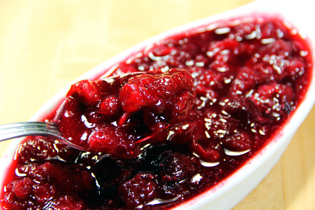 cranberry sauce in a white serving dish