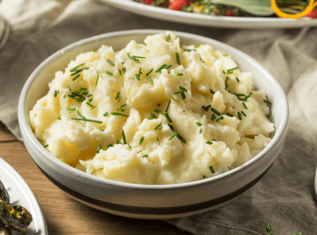 a bowl of garlic mashed potatoes