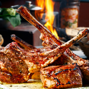 grilled rack of lamb arranged on a plate